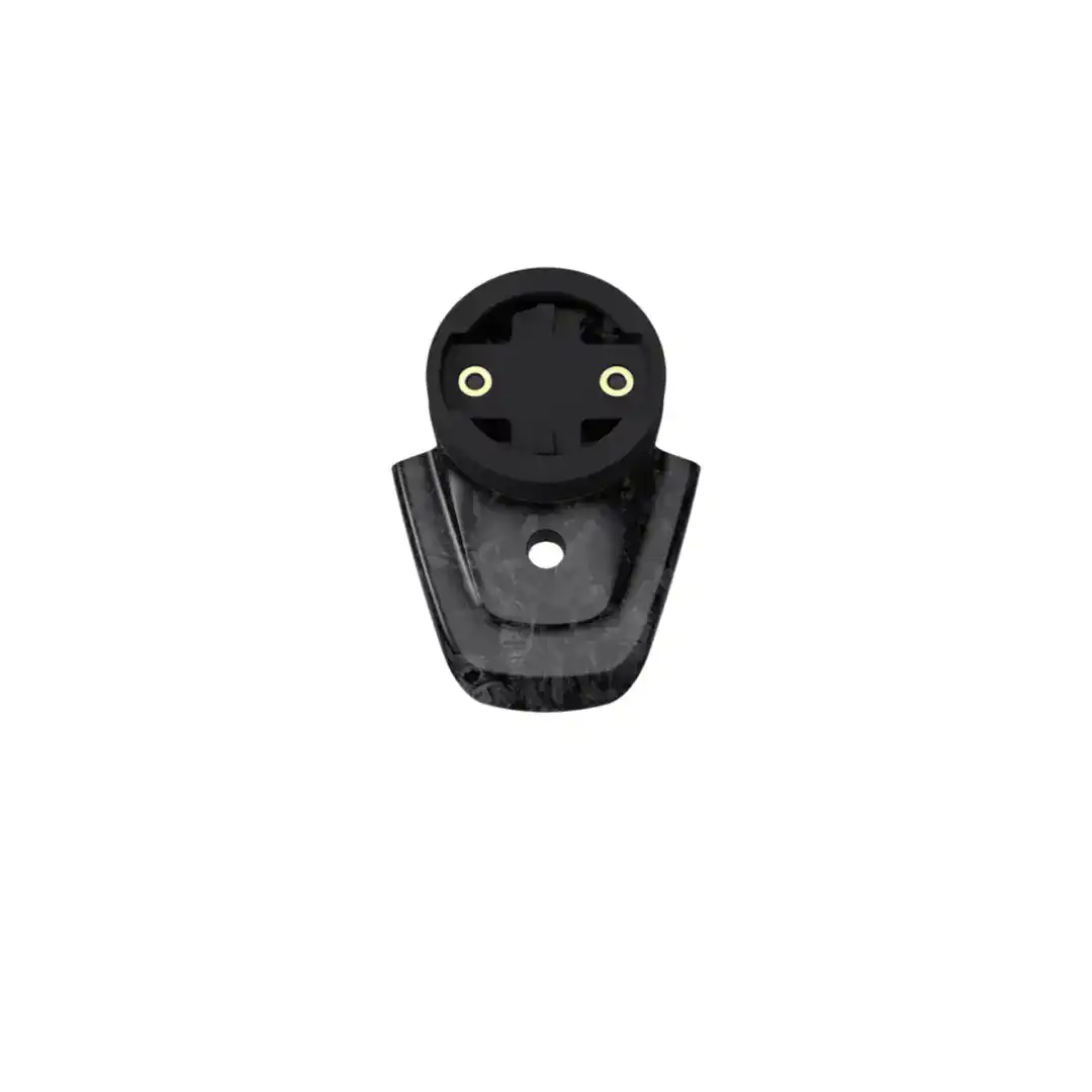 Close-up of a black circular robot-like head with two cream-colored eye dots on either side of a flat face plate.