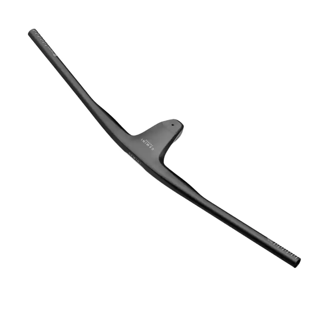 Left end of a black curved bicycle handlebar with a textured grip and visible branding near the stem across the frame edge in diagonal orientation