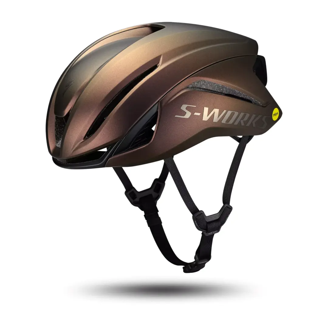 Bronze S-Works bicycle helmet with MIPS yellow sticker, shown from a side angle with vents visible.