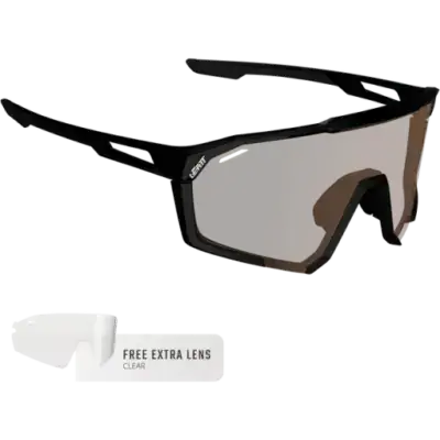 Black sport sunglasses with a brown-tinted lens and a separate white clear replacement lens labeled 'Free extra lens'.