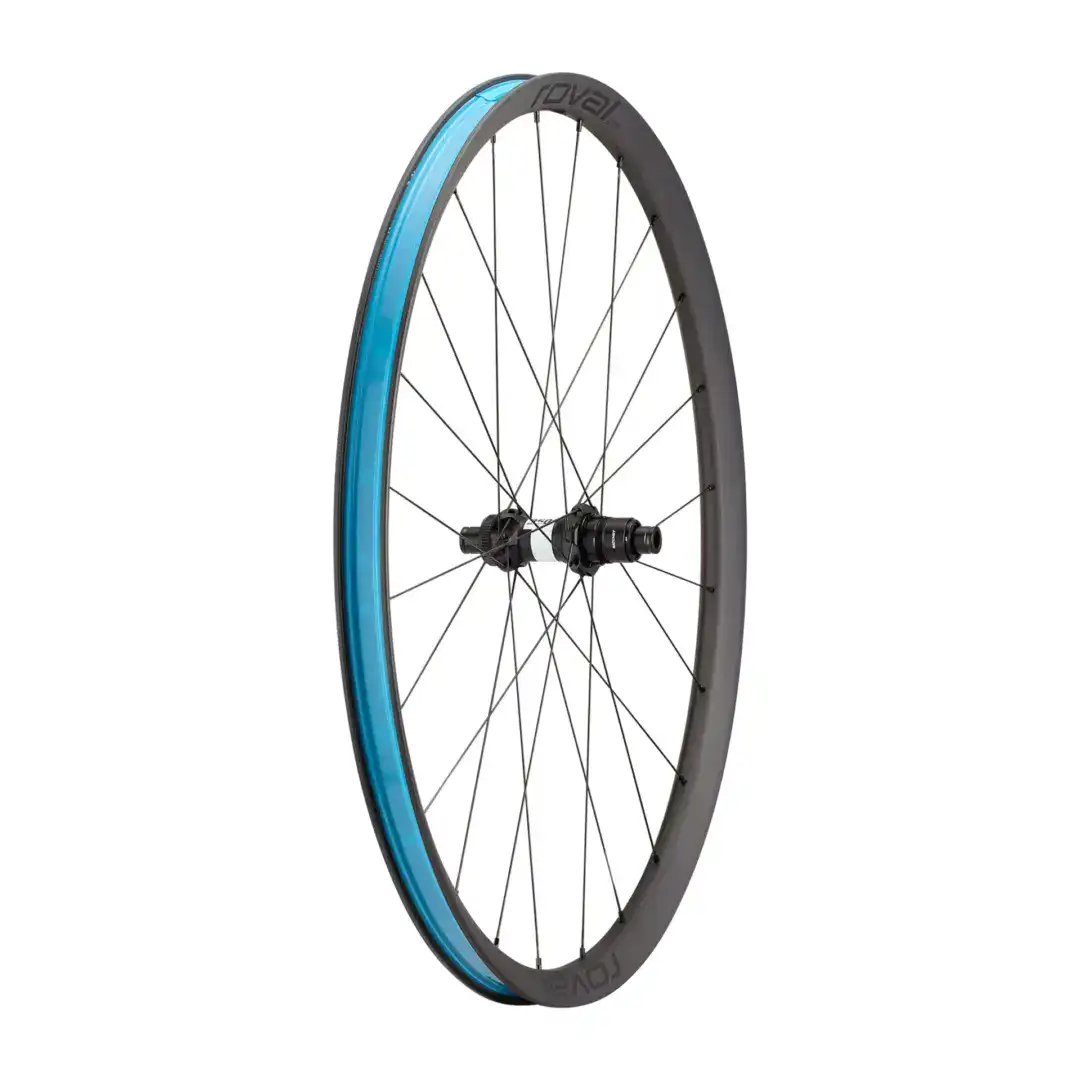 Close-up of a bicycle wheel rim with a turquoise blue edge and black spokes, hub visible at the bottom right.