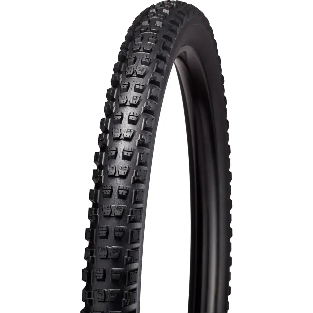 Close-up of a rugged off-road bicycle tire with large square knobs for MTB traction.