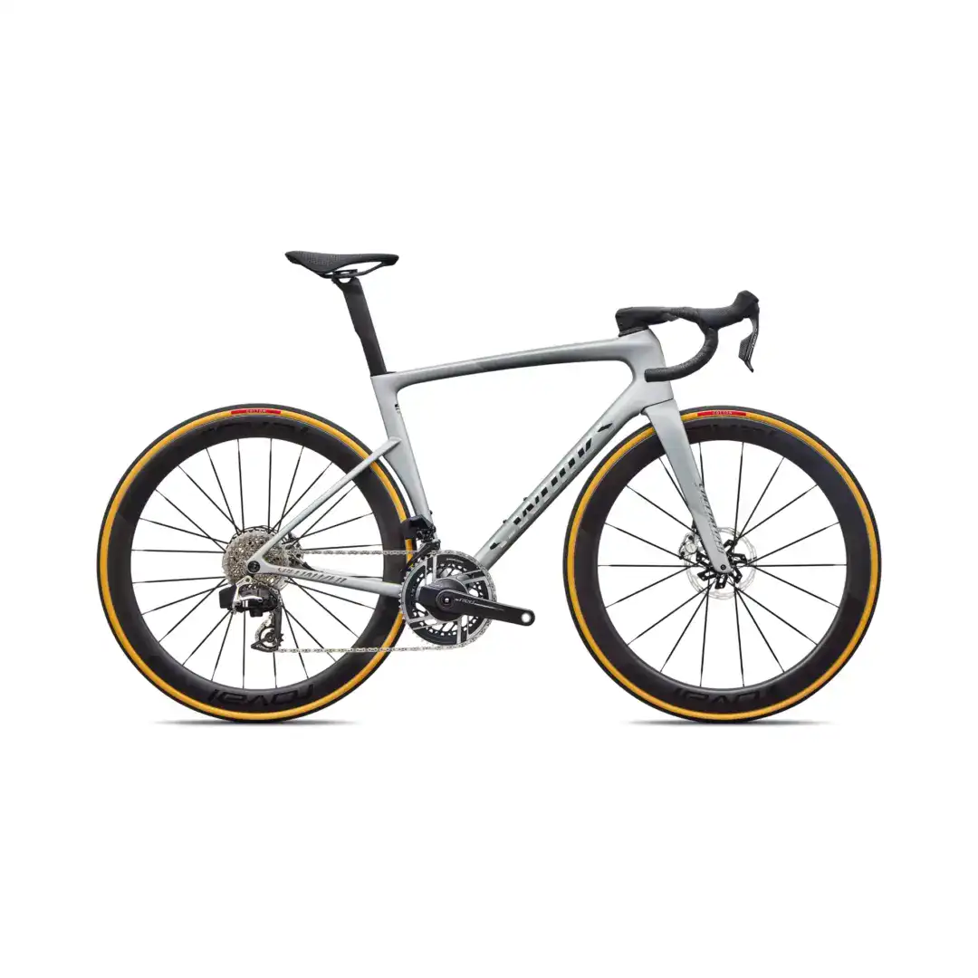Side view of a gray carbon road bike with drop handlebars and yellow-tinted rims, cropped at the top and bottom edges for a minimal composition.