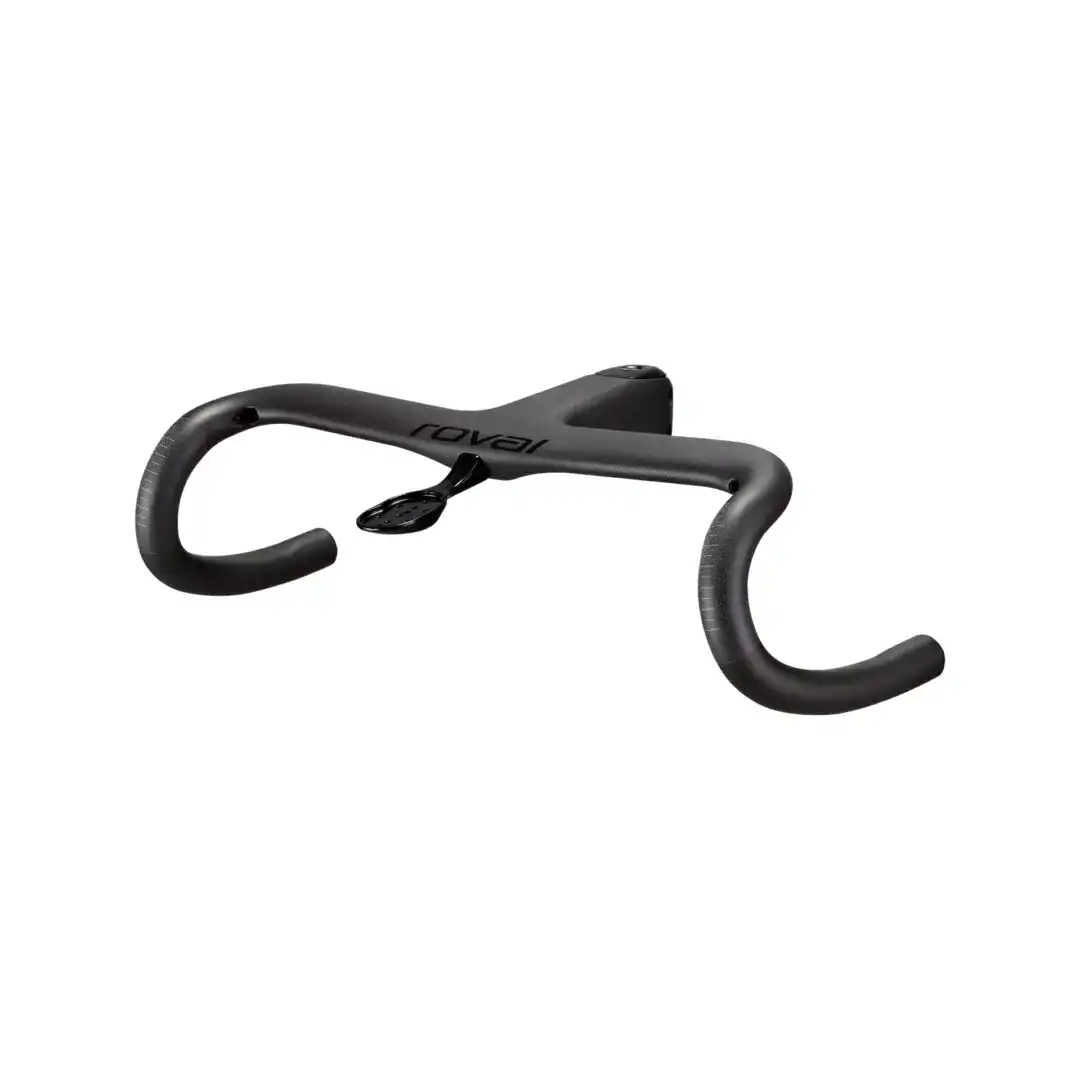 Close-up of black aerodynamic road bike handlebars with integrated brake/shift lever and textured grips (Roval branding).
