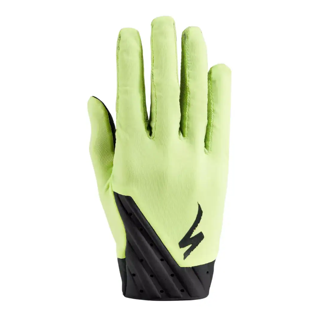 Close-up of a neon green sports glove with a black wrist strap on a white background, viewed from the back of the hand.