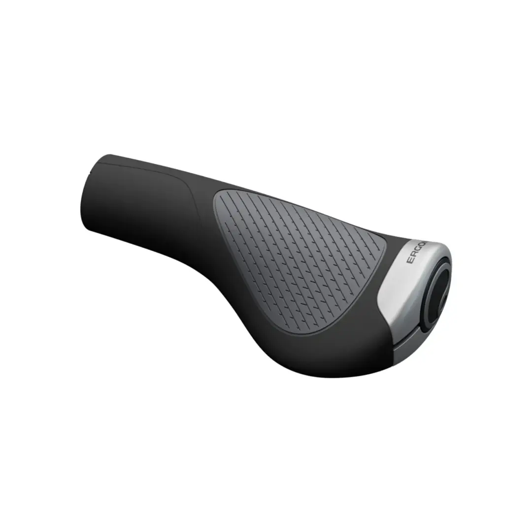 Close-up of a black scooter handlebar grip with a textured gray pad and throttle housing