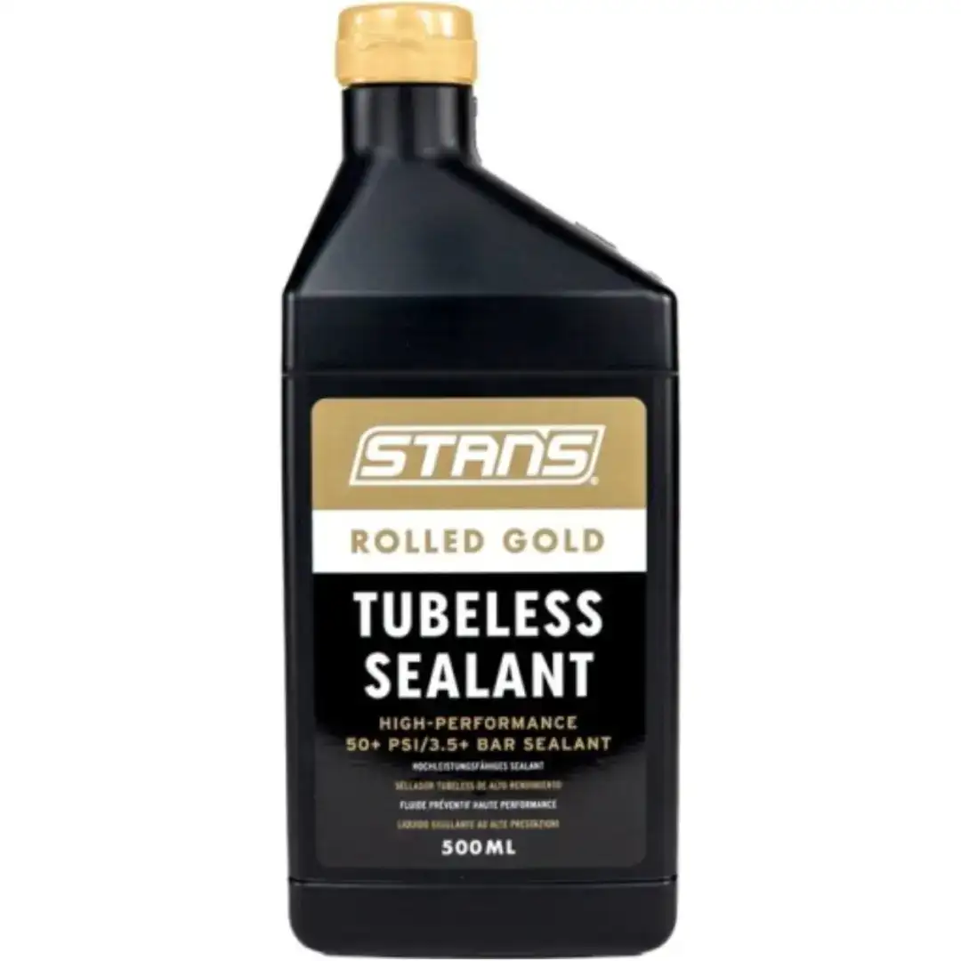 Stan's Tubeless Sealant bottle, 500 ml, black container with a gold 'Rolled Gold' label.